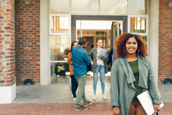 college student in front of building